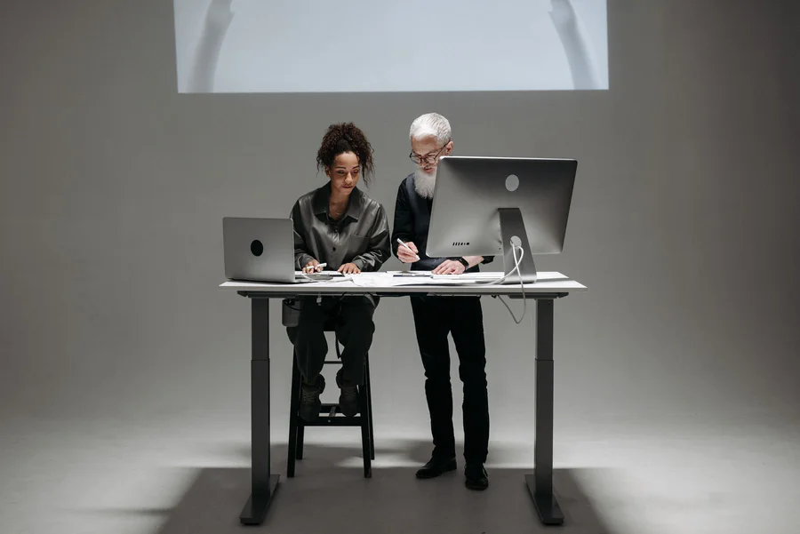 Two professionals turning business expertise into clear digital evidence.